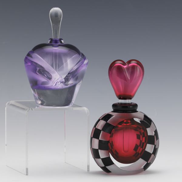 TWO GLASS PERFUME BOTTLES One 2afd71