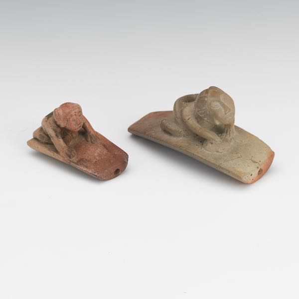 TWO CARVED EFFIGY PIPES OF HUMANS