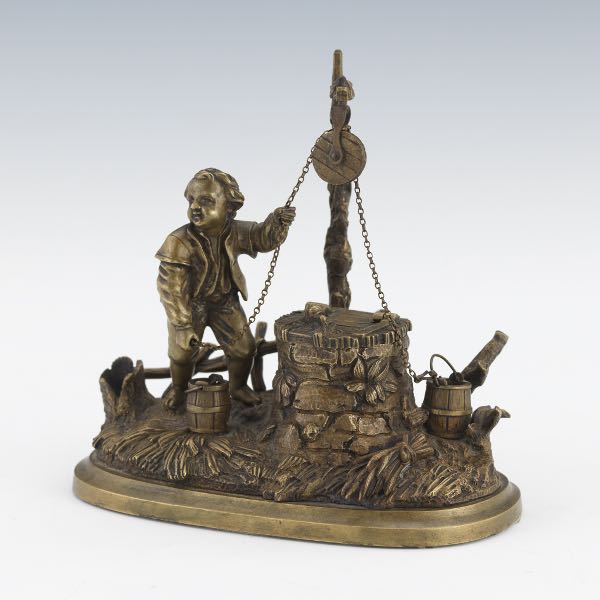 BRONZE INKWELL OF A BOY AT A WELL