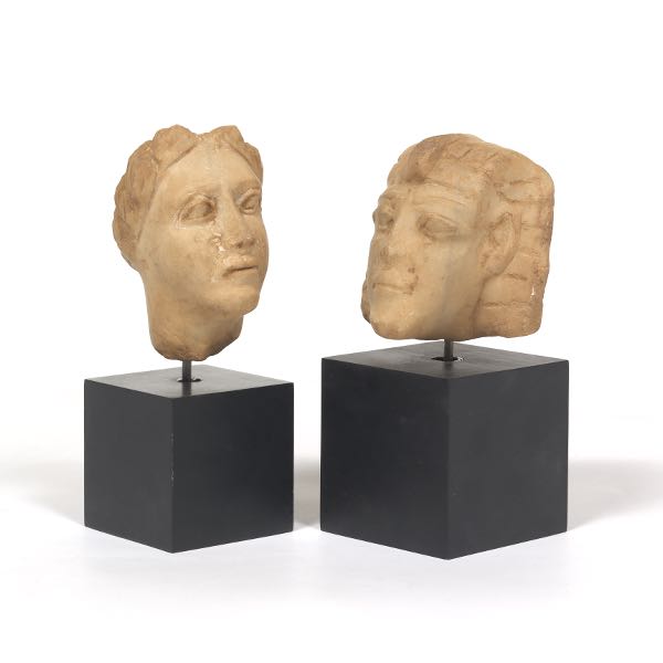TWO STONE BUSTS ON STANDS  Two