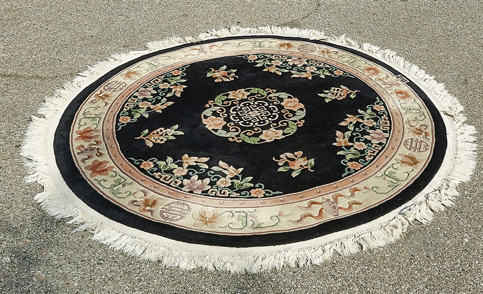 Round Chinese rug; with central