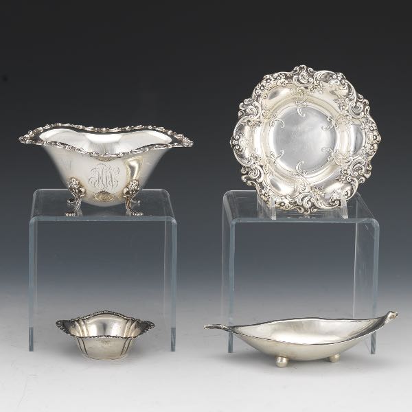 FOUR STERLING TABLE DISHES  One 800