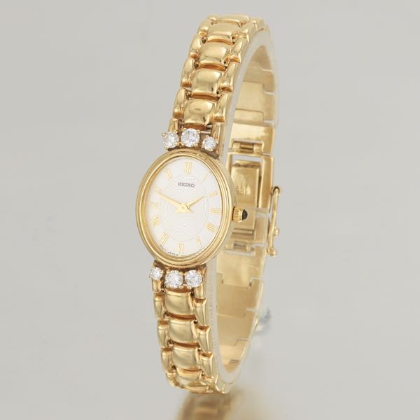 SEIKO 14K LADIES' GOLD AND DIAMOND