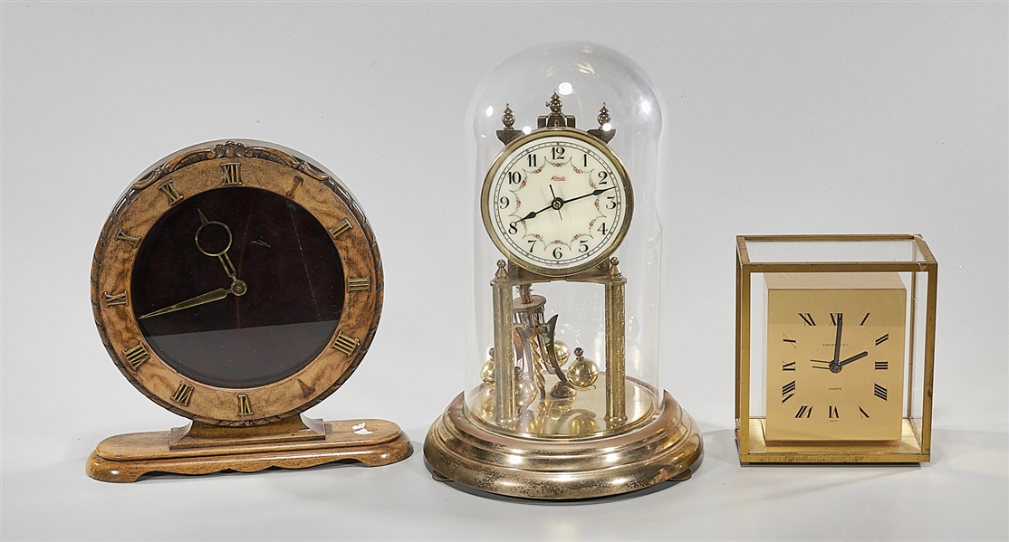 Group of three clocks including 2ae431