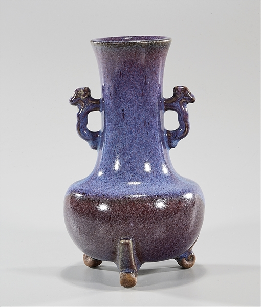 Chinese flambe glazed tripod vase;