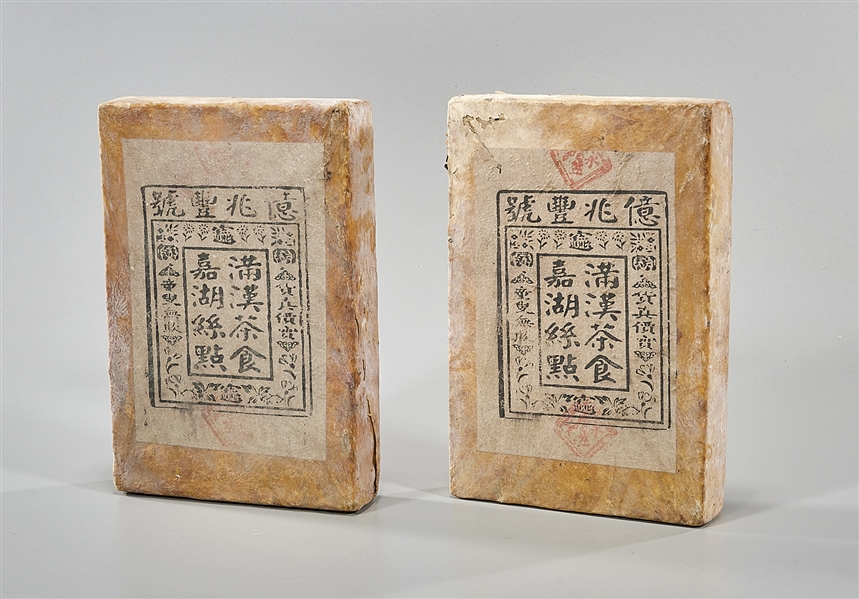 Two Chinese compressed tea bricks  2ae4cb
