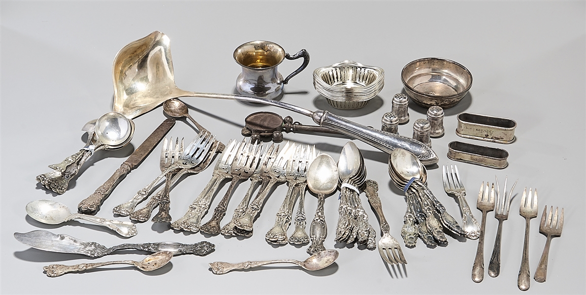 Large group of sterling silverware;