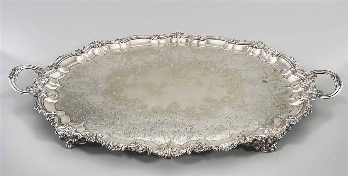 Two large elaborate silver plate