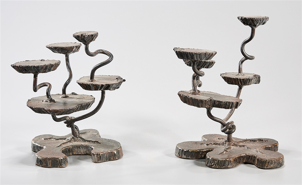 Two bronze lily plant sculptures;