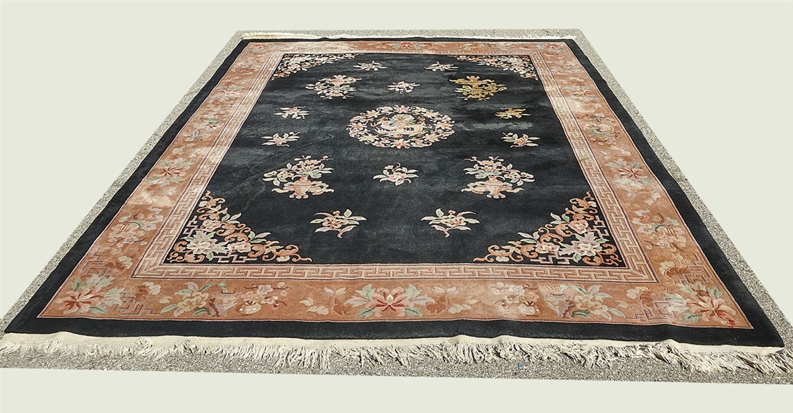 Black Chinese wool rug; with dragon