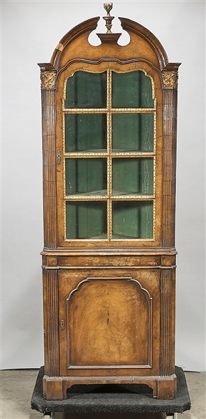 Antique corner cabinet; with fluted