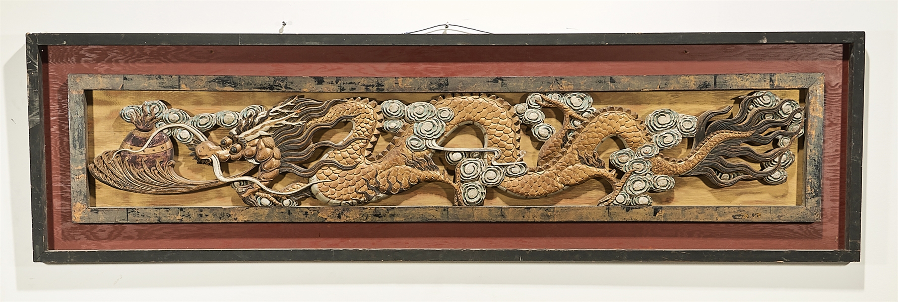 Chinese carved wood framed panel;