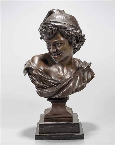Bronze bust of a young woman wearing