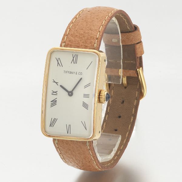 TIFFANY & CO. 18K GOLD TANK WATCH, WITH