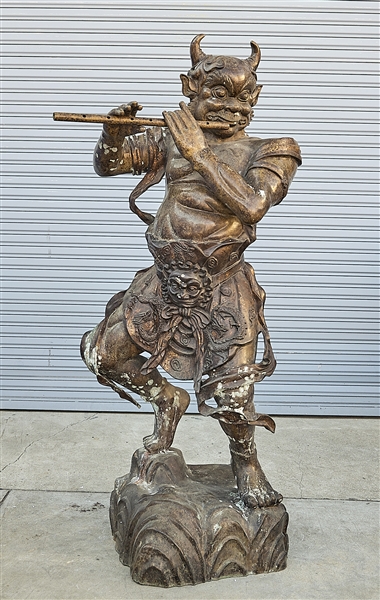 Large Chinese bronze deity; playing