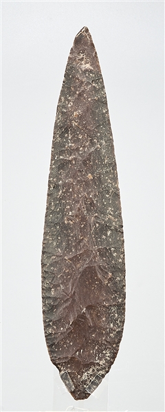 Ancient stone spearpoint; on lucite