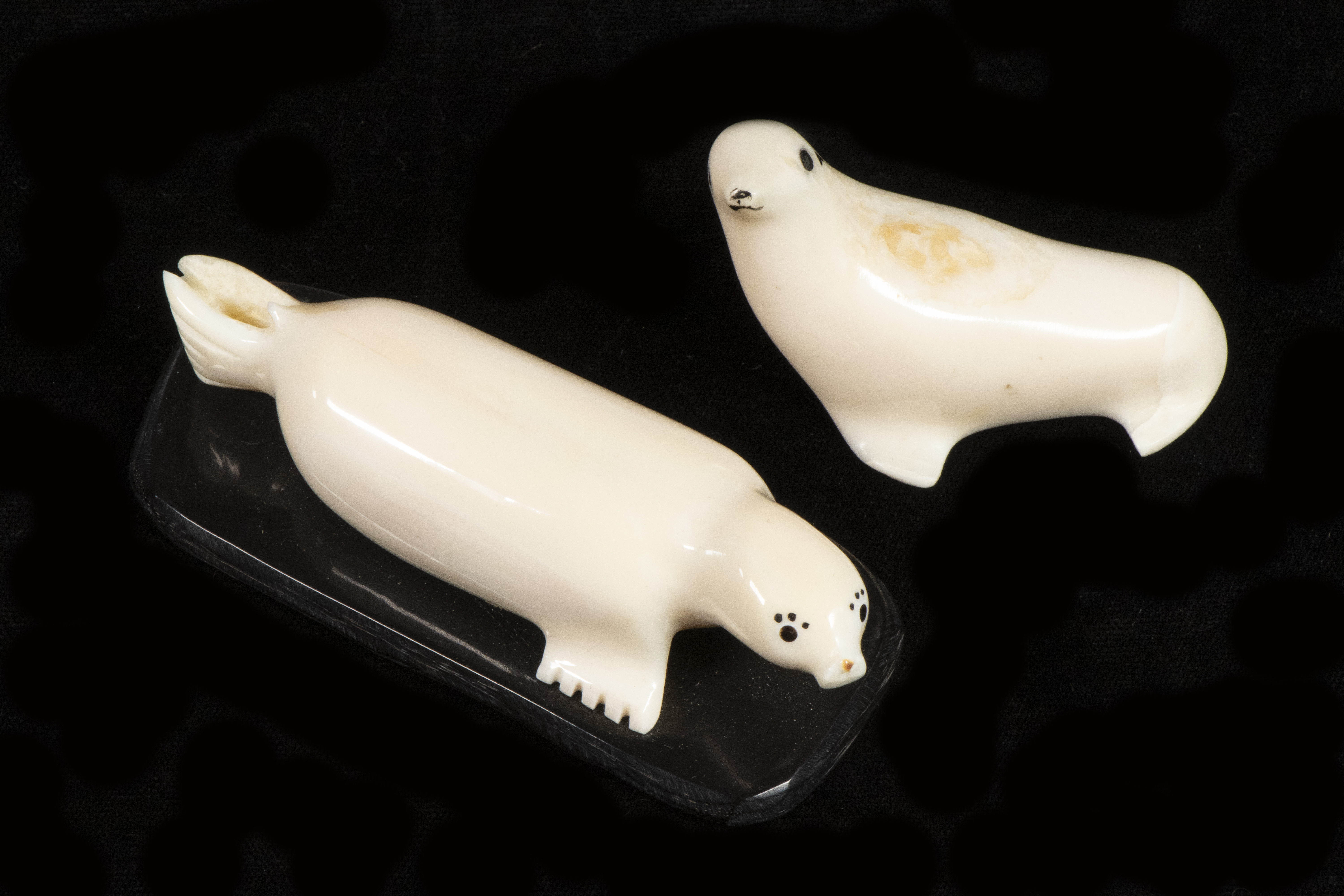 (2) INUIT SCULPTURES OF SEALS BY JERRY