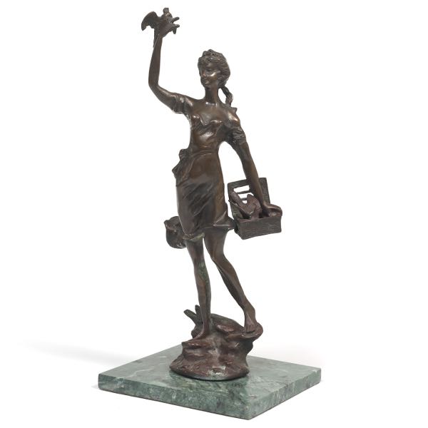 DECORATIVE SCULPTURE OF A GIRL HOLDING