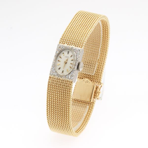 LADIES' GIRARD PERREGAUX GOLD AND