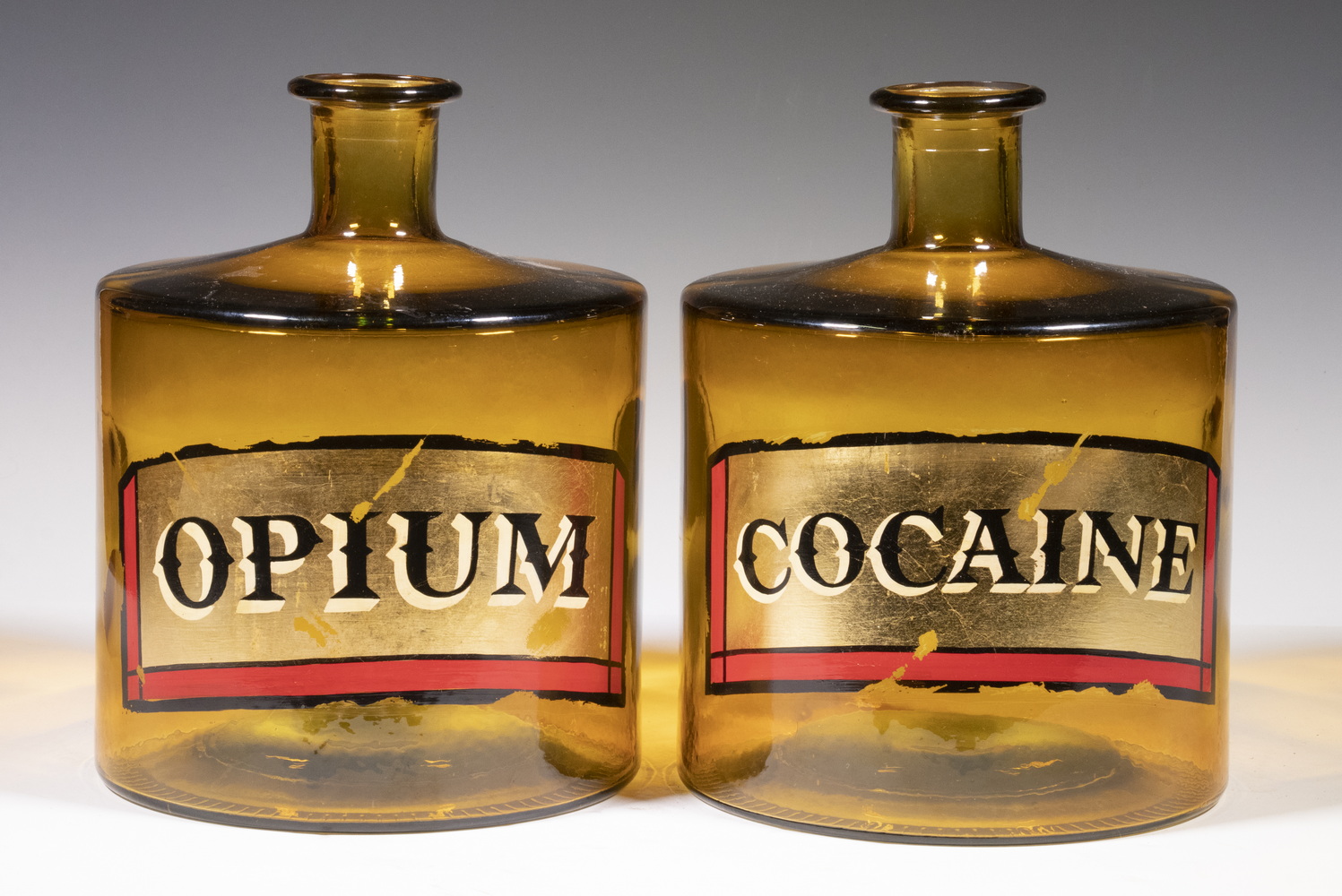 (PAIR) BROWN GLASS APOTHECARY JARS COCAINE