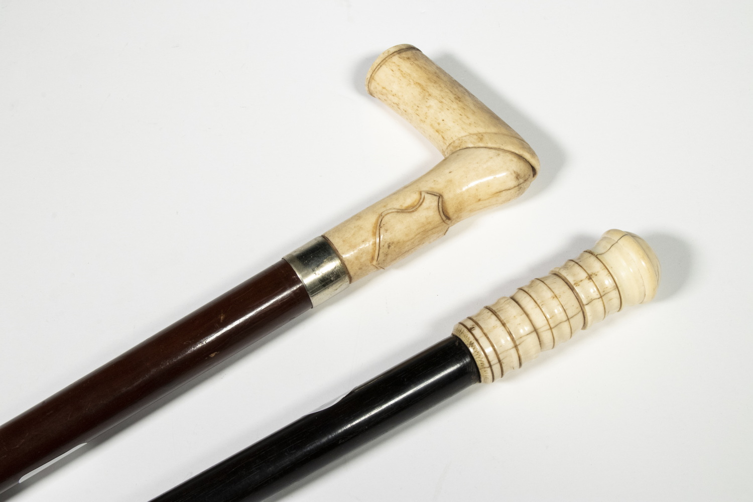 (2) 19TH C. IVORY TOPPED WALKING STICKS