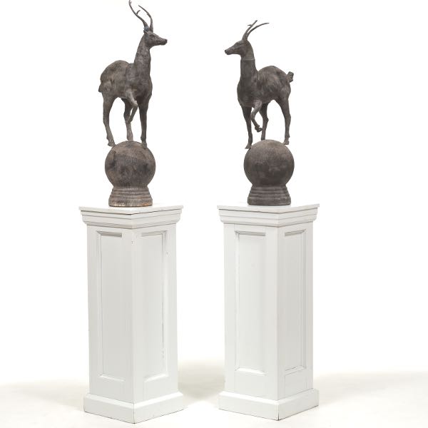 TWO IRON ANTILOPE SCULPTURES ON