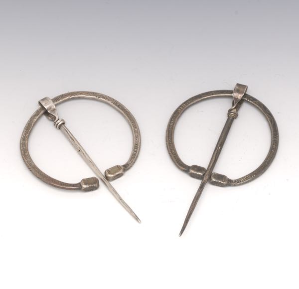 TWO STERLING ANTIQUE CELTIC PENANNULAR