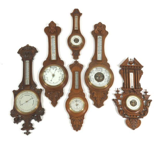 SIX VICTORIAN CARVED OAK CASED BAROMETERS