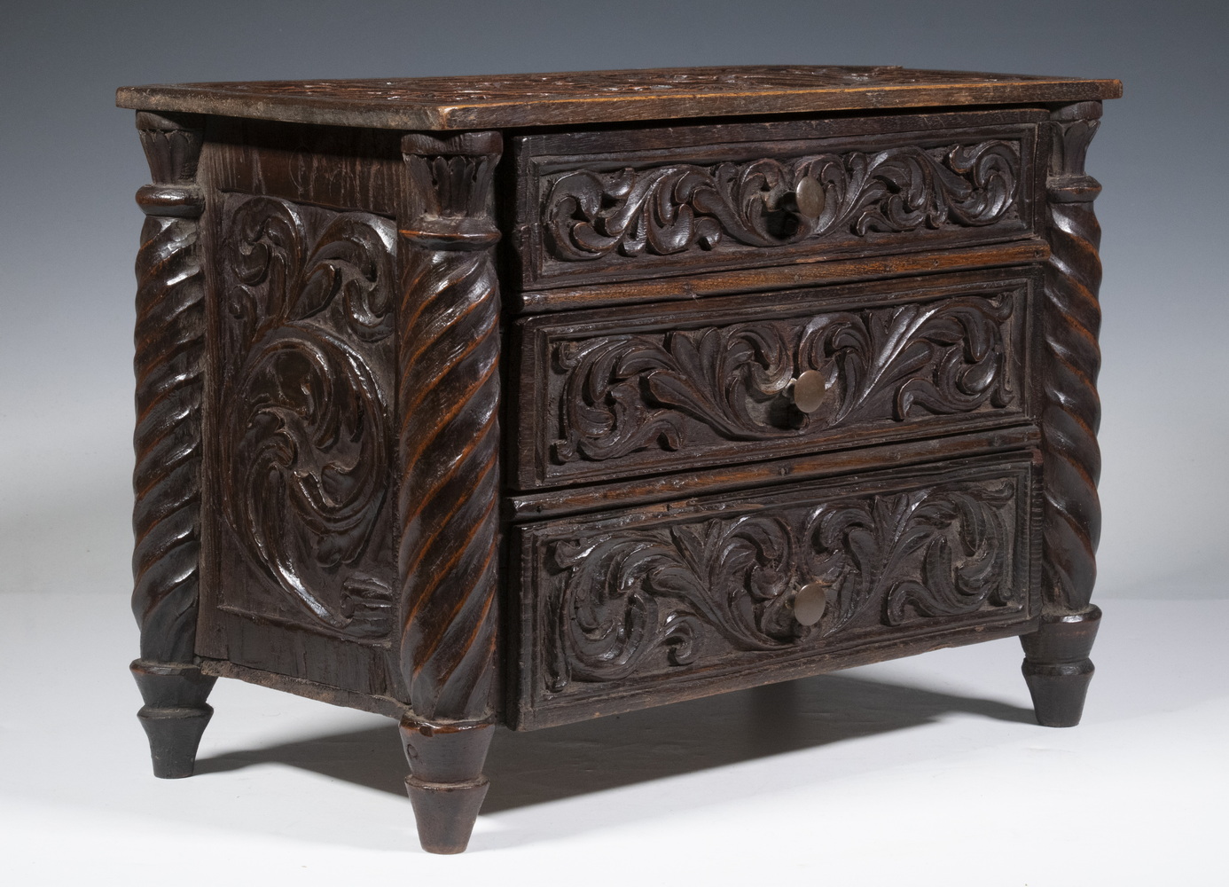MINIATURE CARVED CHEST OF DRAWERS