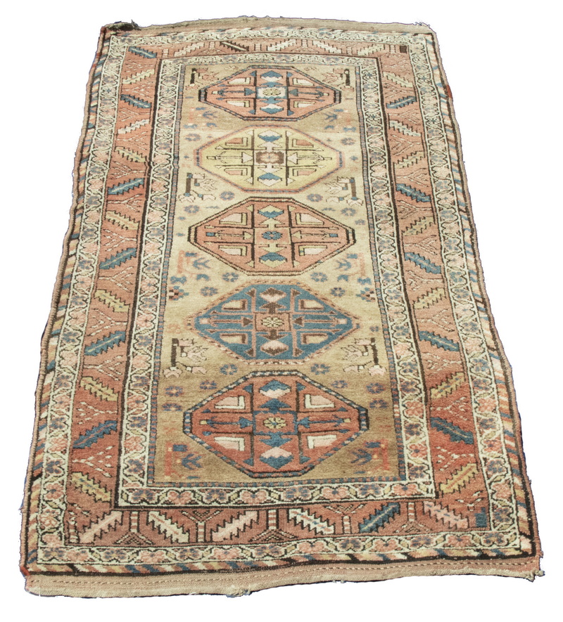 KAZAK RUG A column of five octagons