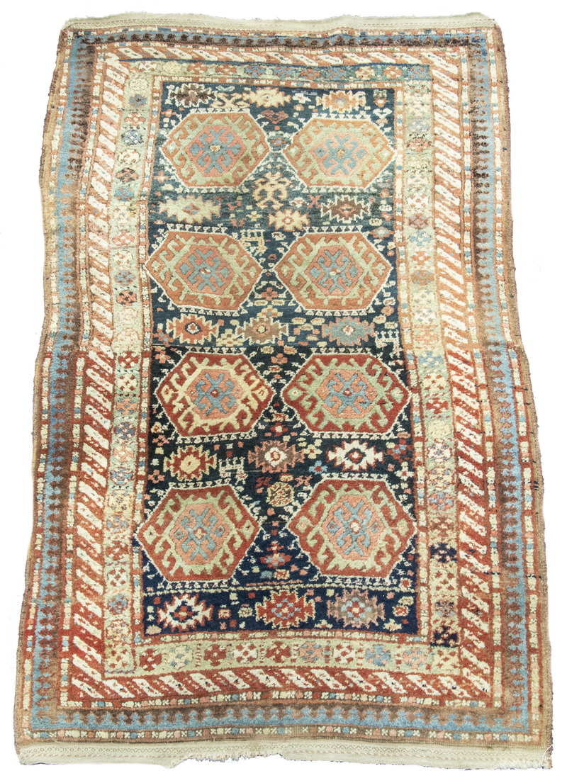 KAZAK RUG Two columns of four hexagonal