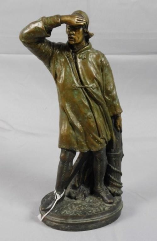 BRONZE SCULPTURE OF A FISHERMAN.