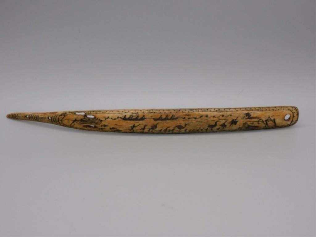 INUIT SCRIMSHAW CARVING.A carved