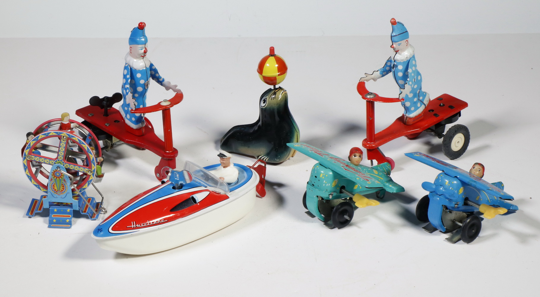  7 TIN LITHO TOYS Including 2  2b366c