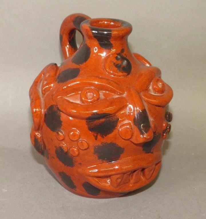 SMALL FOLK ART REDWARE FACE JUG