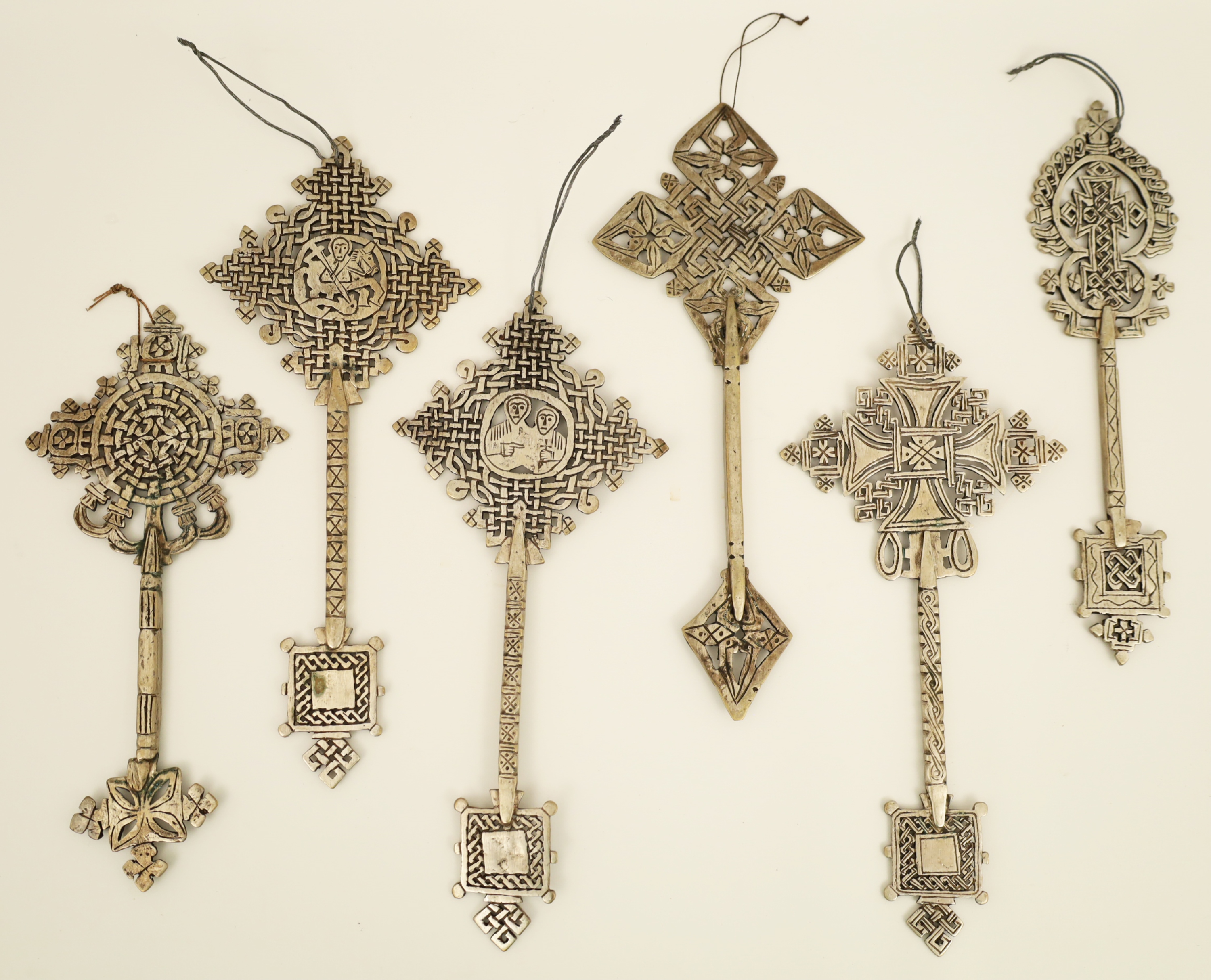 SIX ETHIOPIAN SILVER HAND CROSSES