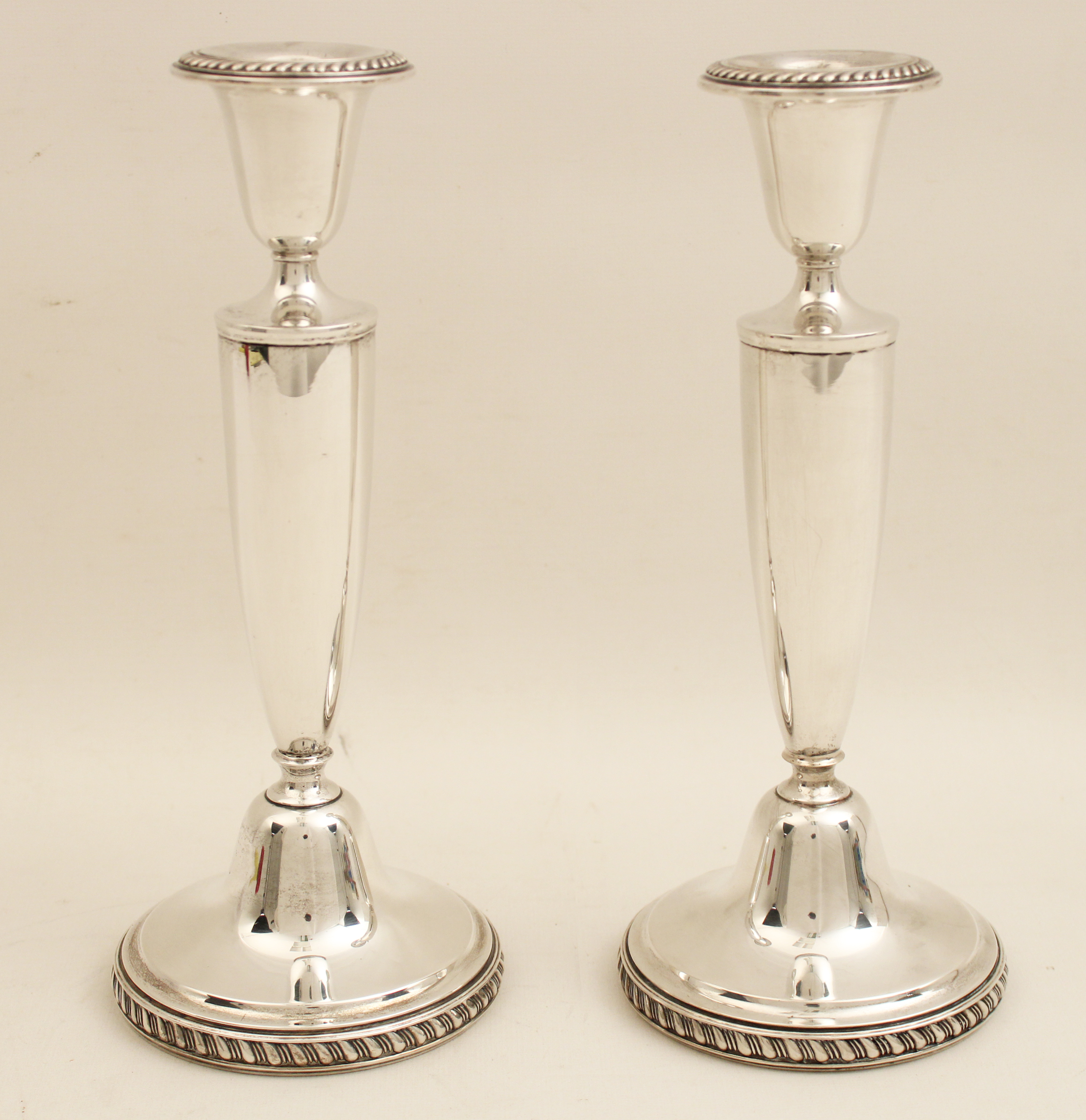 PAIR OF STERLING SILVER CANDLESTICKS