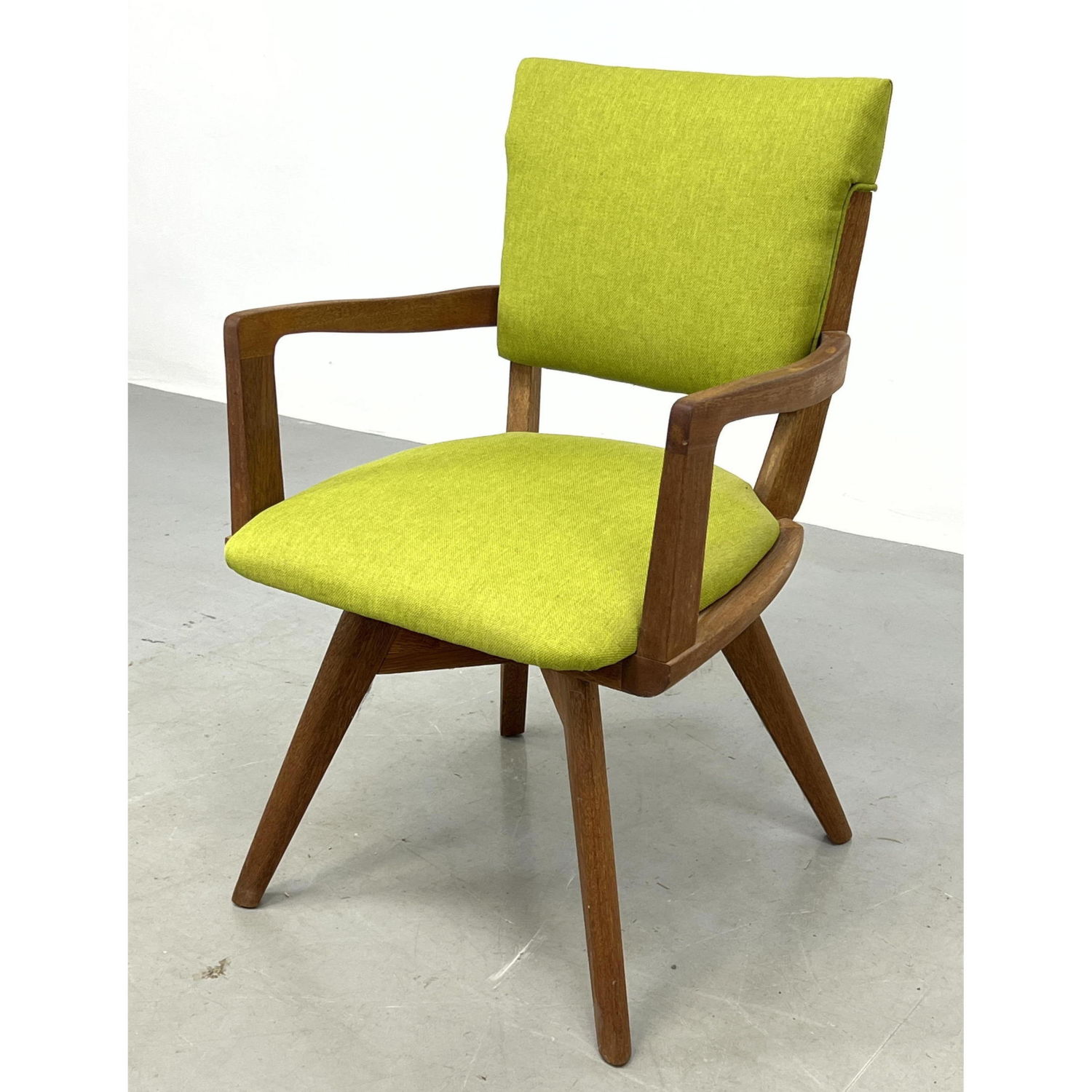 Modernist Swivel Open Arm Chair.