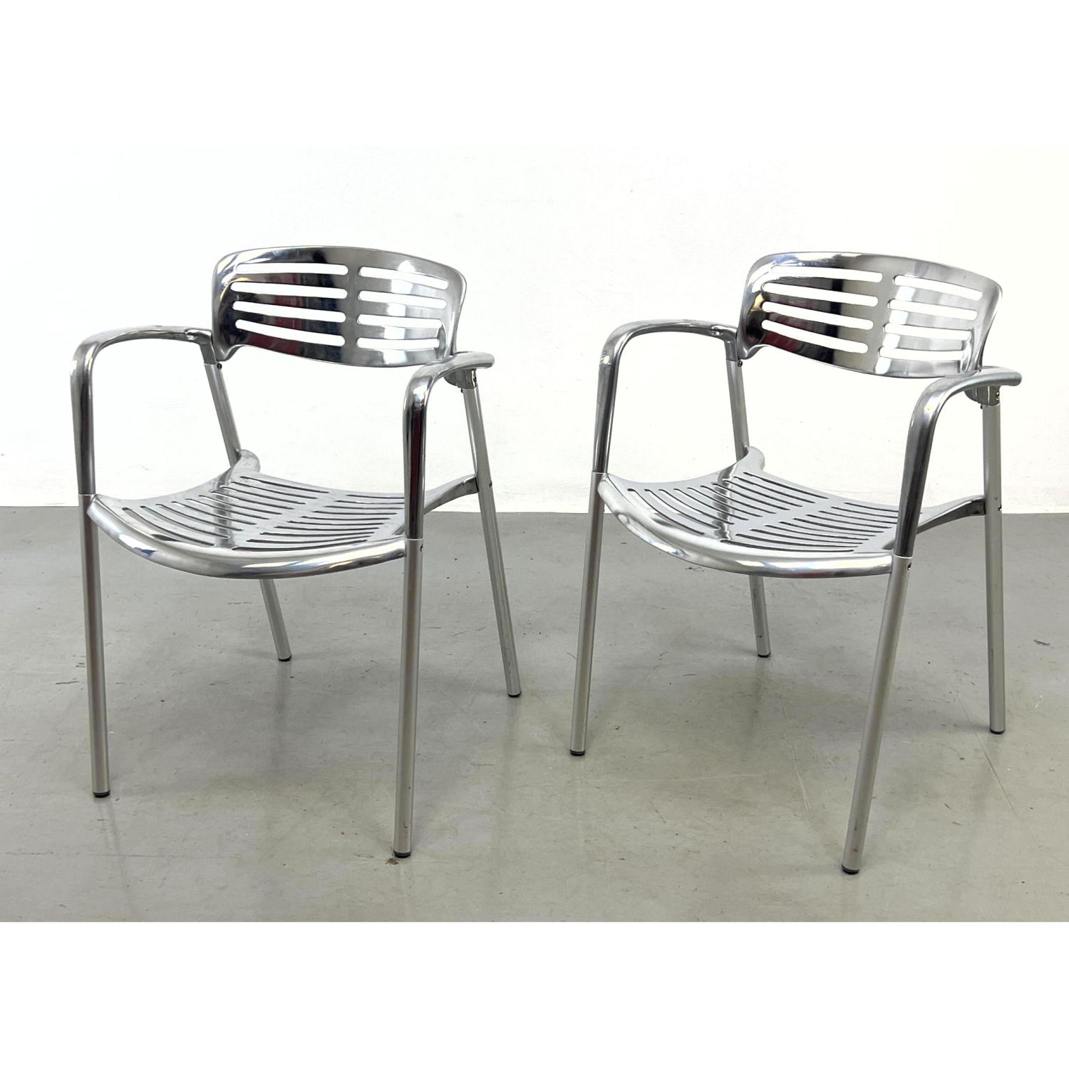Pair Aluminum Arm Chairs. In the