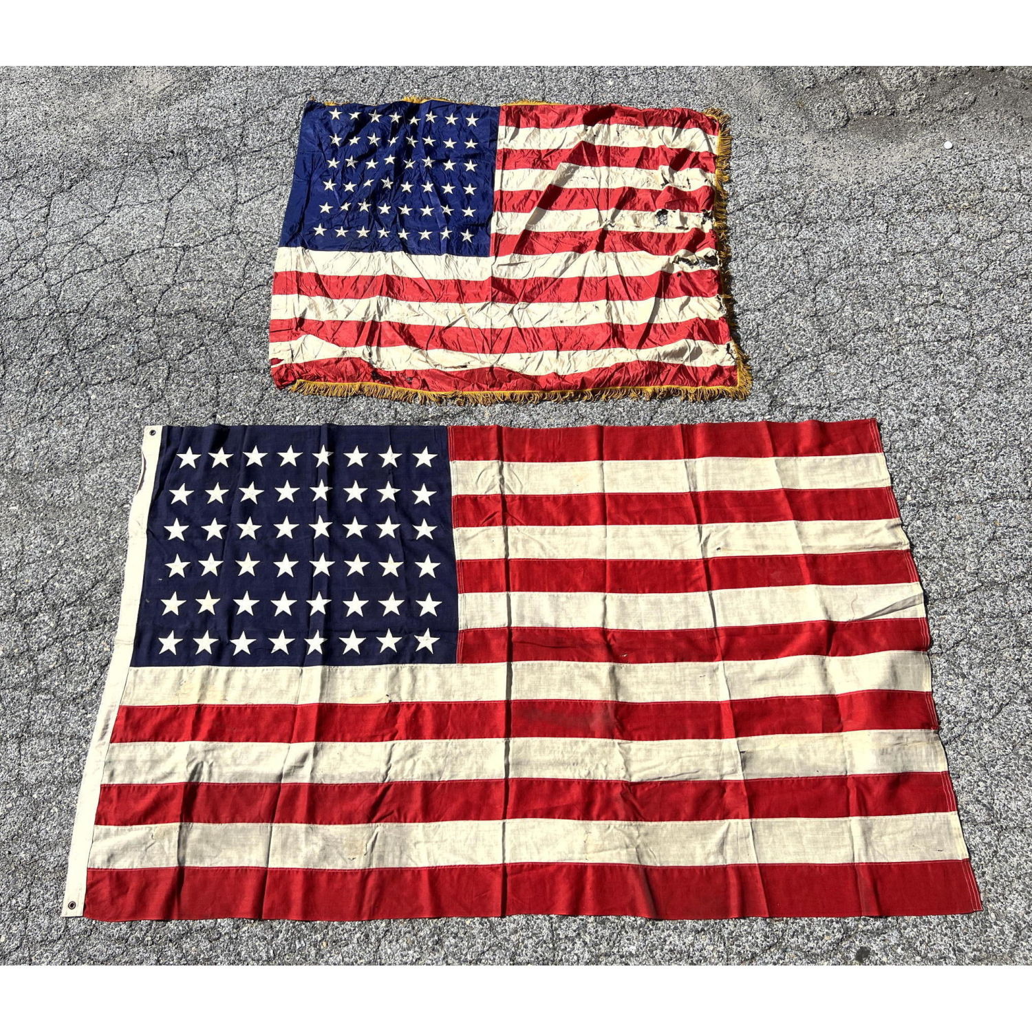 Two 48 star flags. 96 inches. 64 inches.