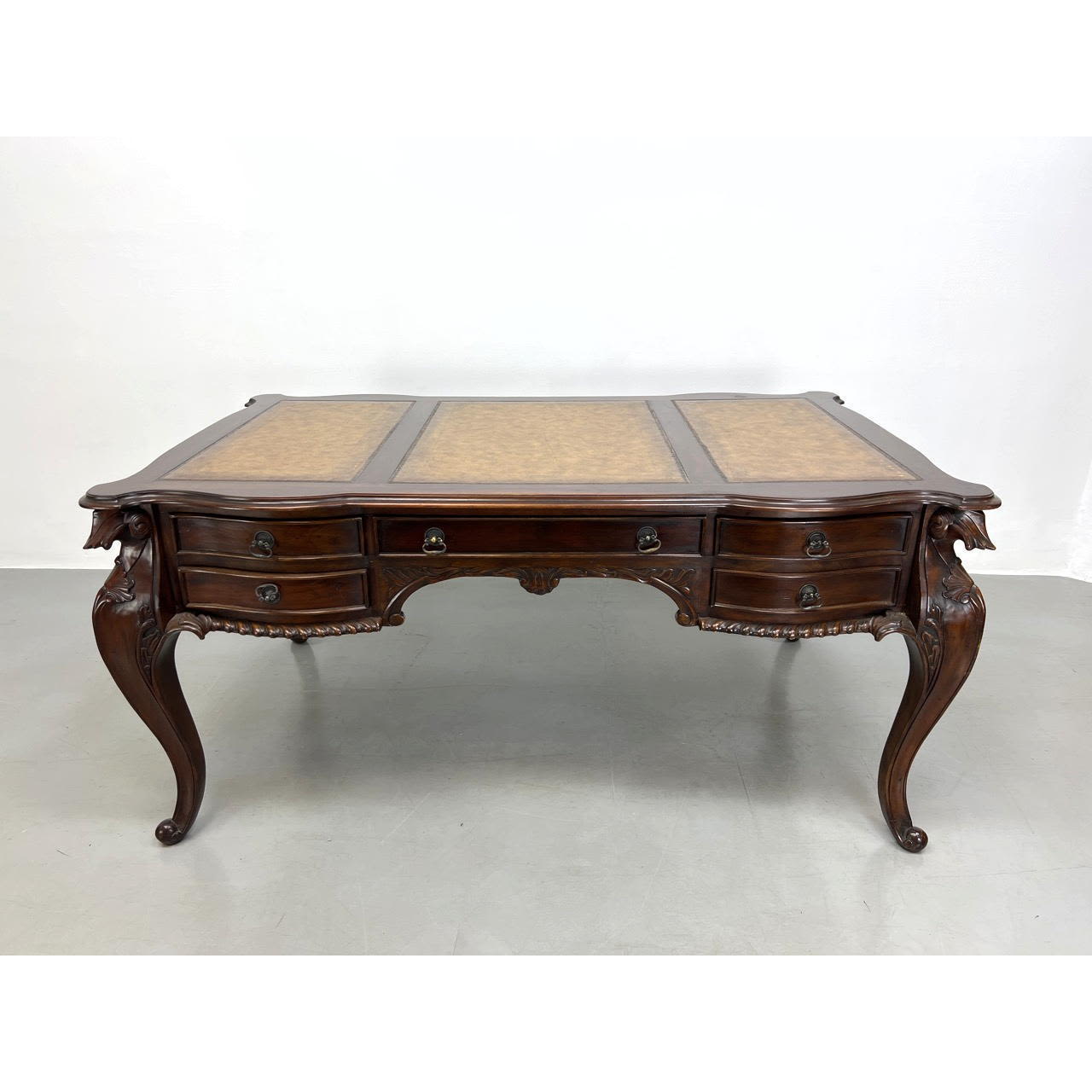 Leather Top Mahogany Desk. Carved