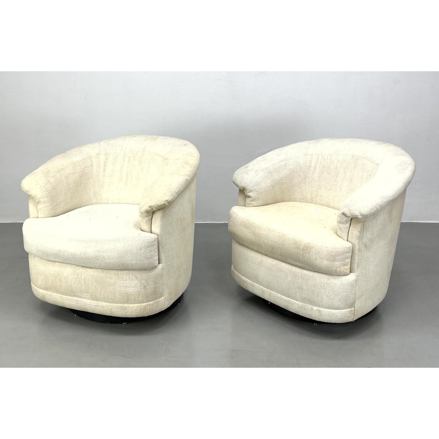 Pair of Swivel chairs. They swivel