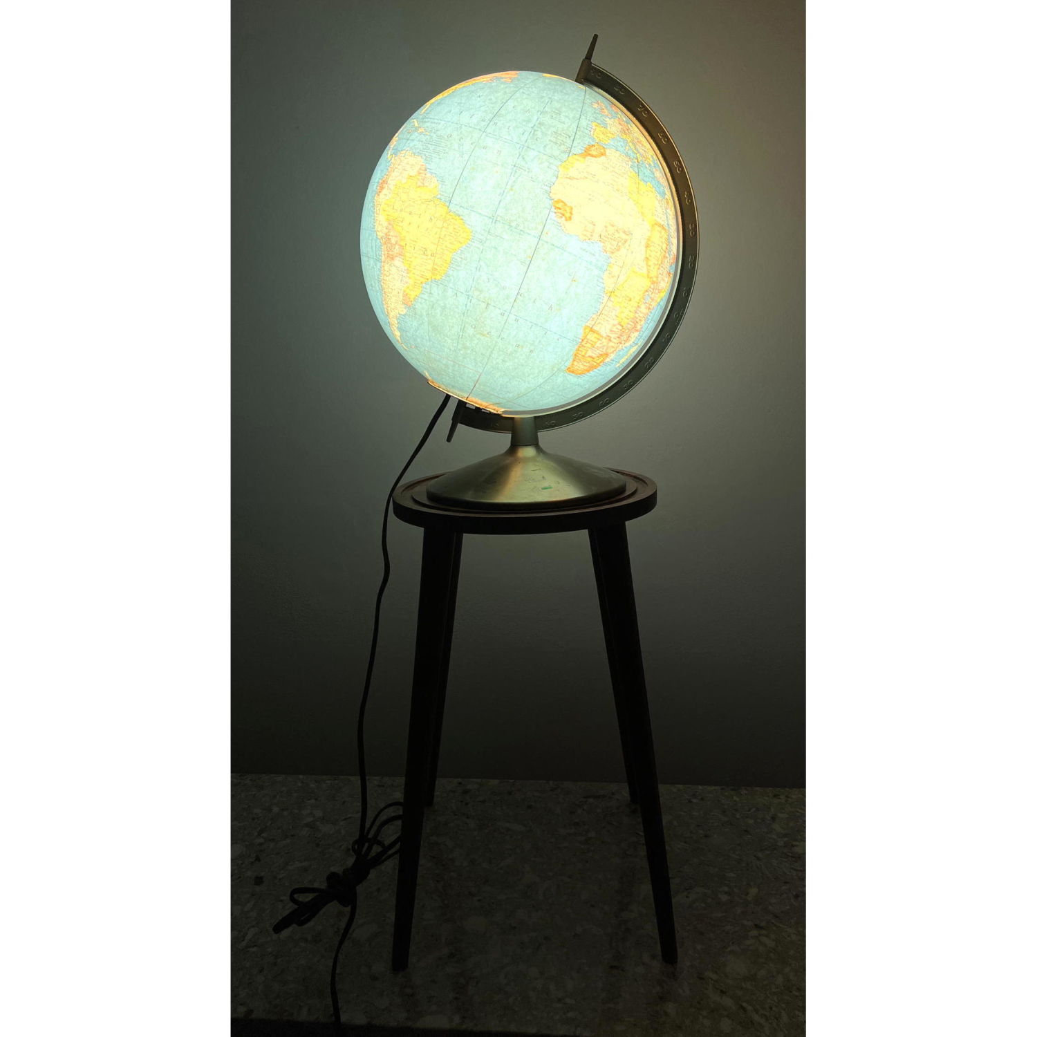 Glass light up globe on walnut