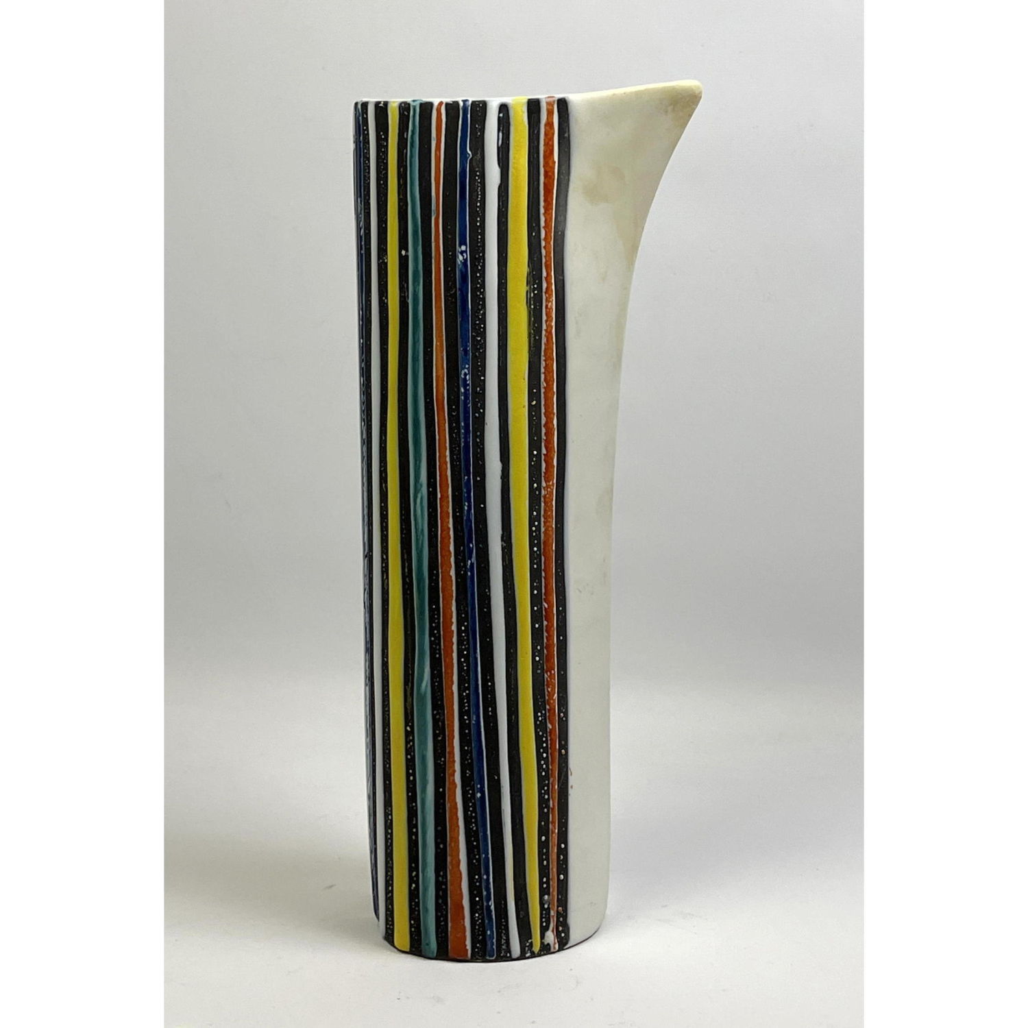 ROGER CAPRON striped pottery pitcher.