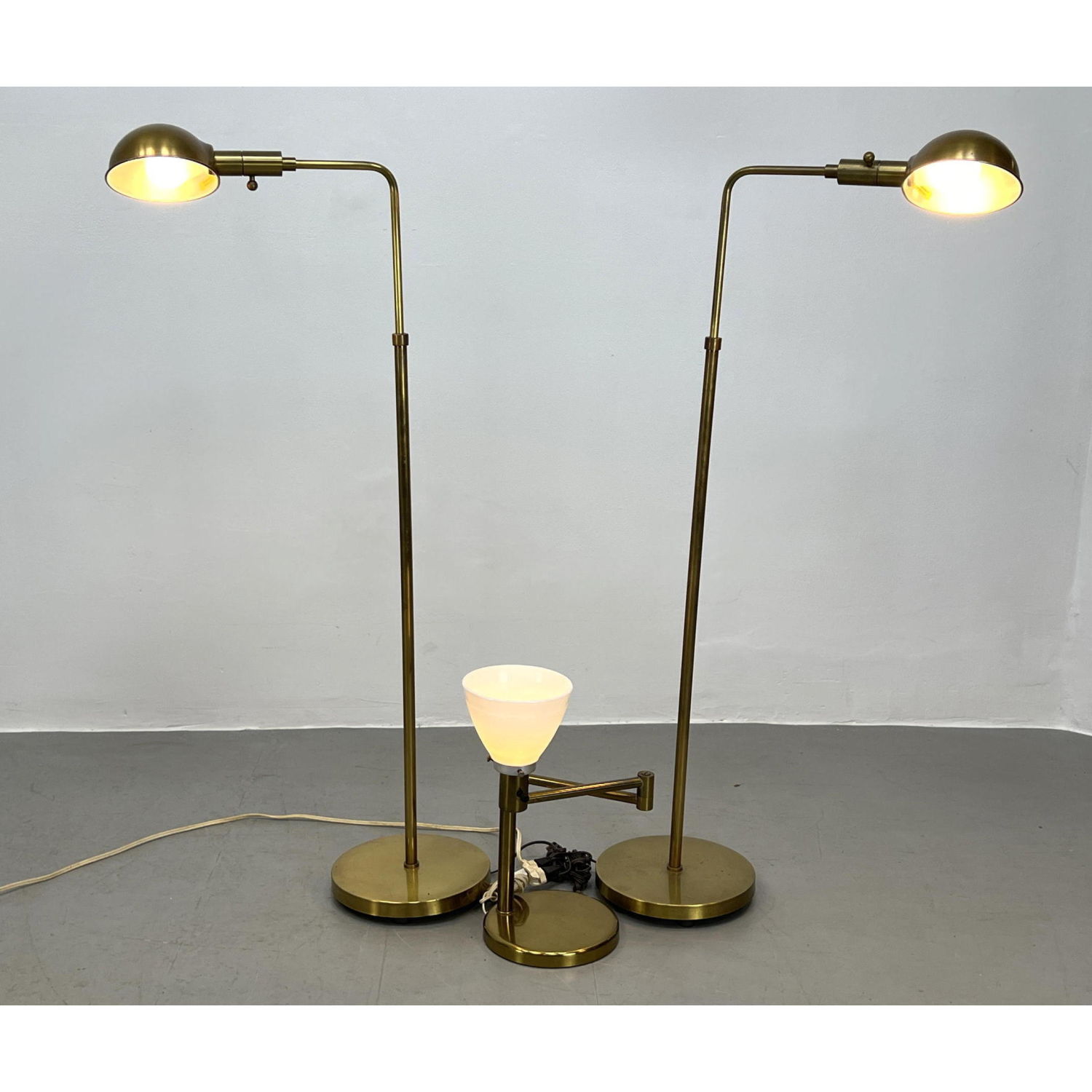 3 Modernist Brass Lamps. Some marked