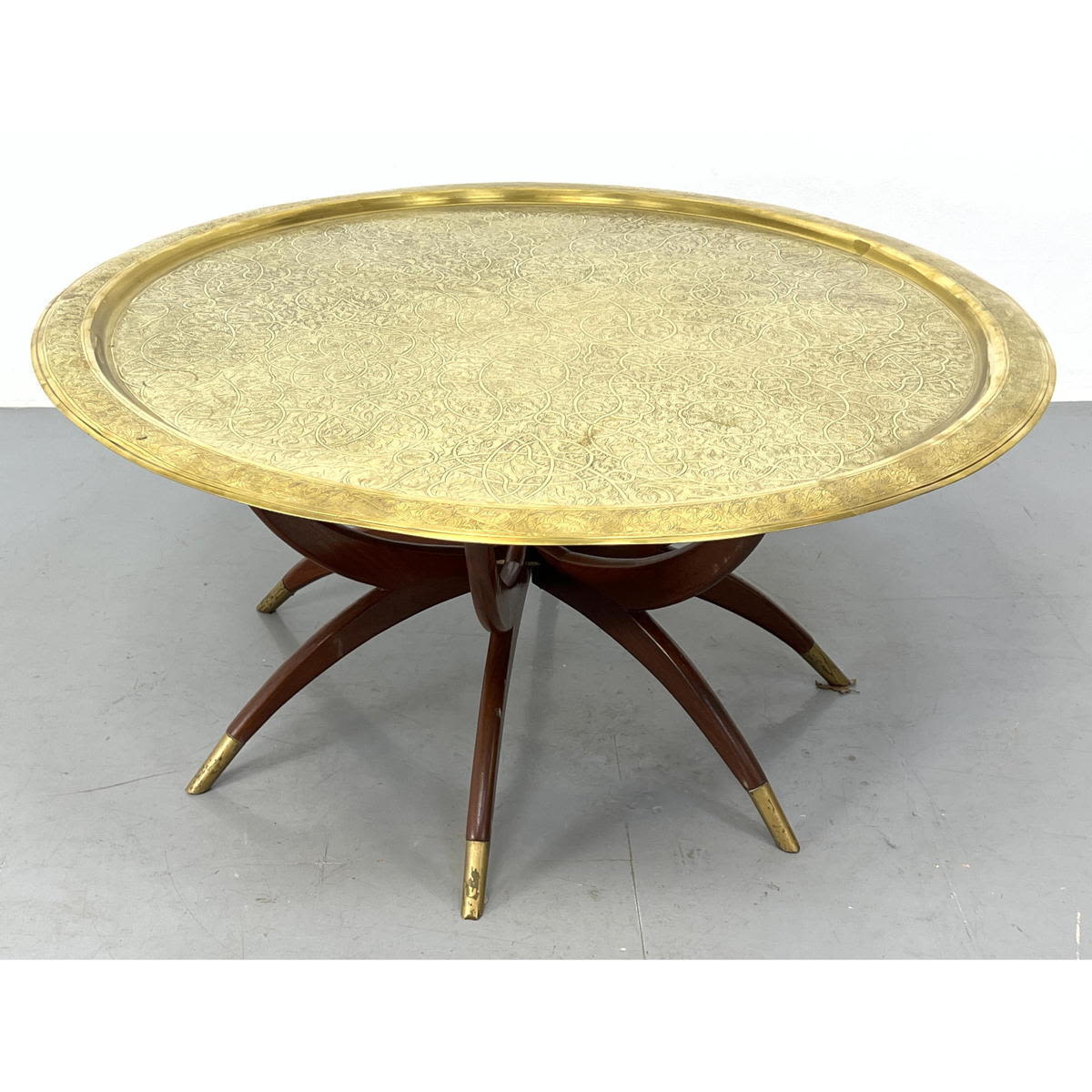 Brass tray spider leg coffee table.