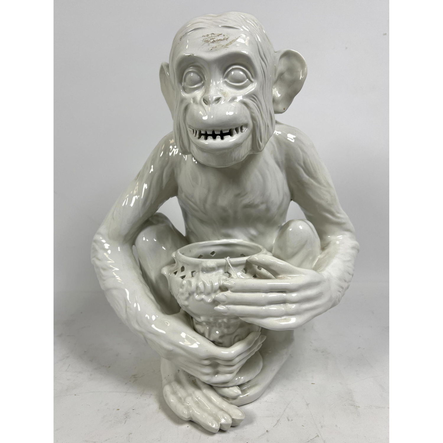 White ceramic monkey. Made in Italy.