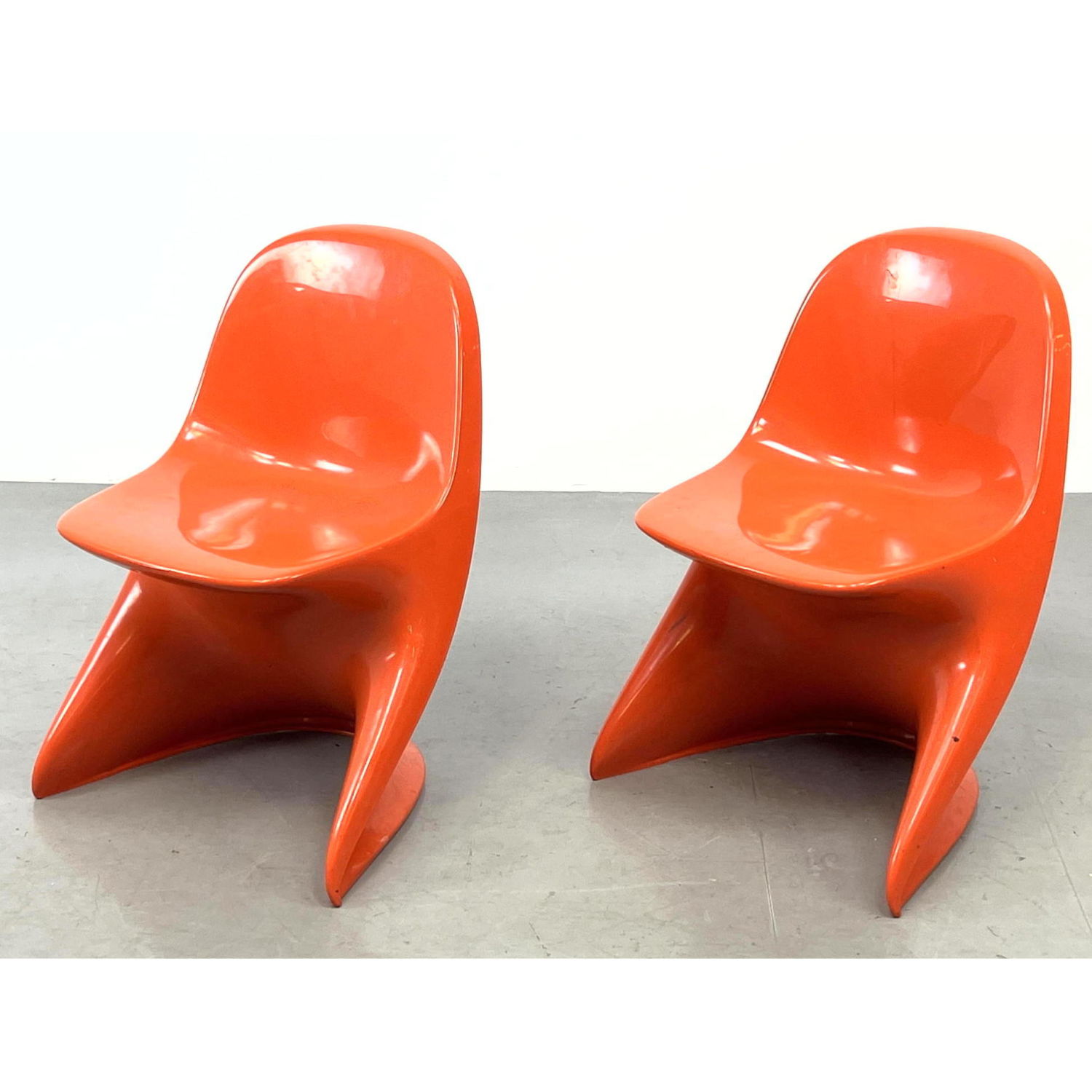 Child's size Caslino I orange Chairs.