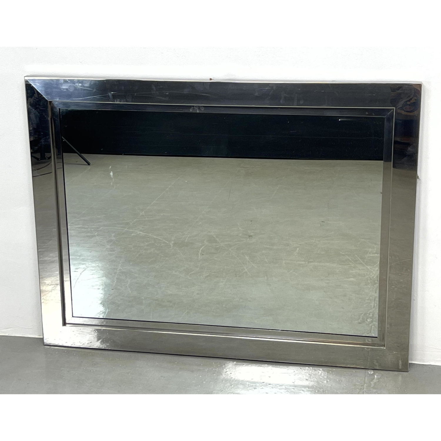 Stainless Steel framed Wall Mirror.