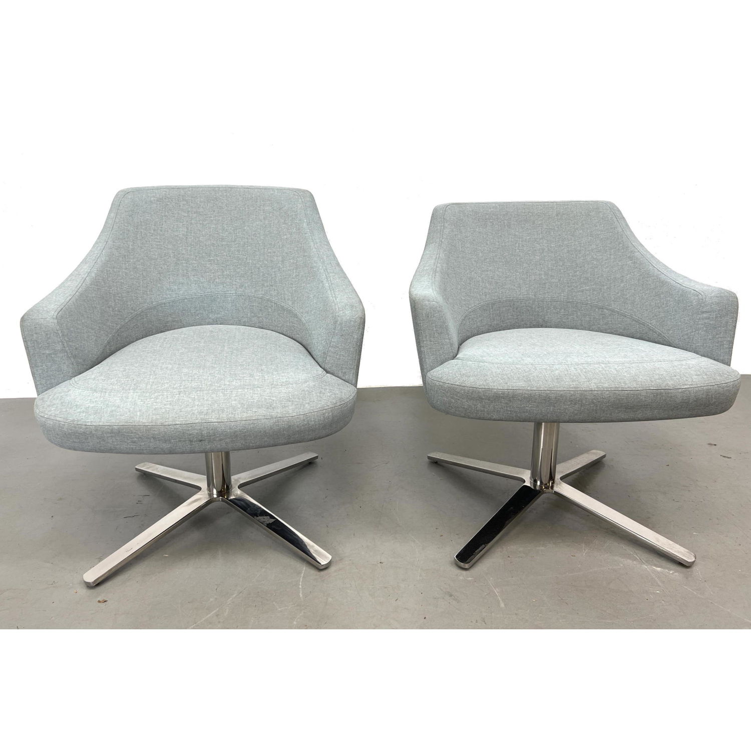 Pr CUMBERLAND Swivel Lounge Chairs.